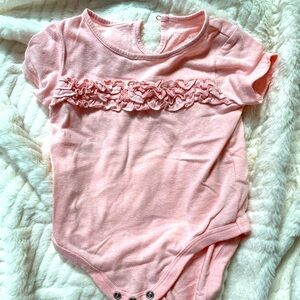 Soft pink onesie with ruffles on the chest - BUNDLE ME!